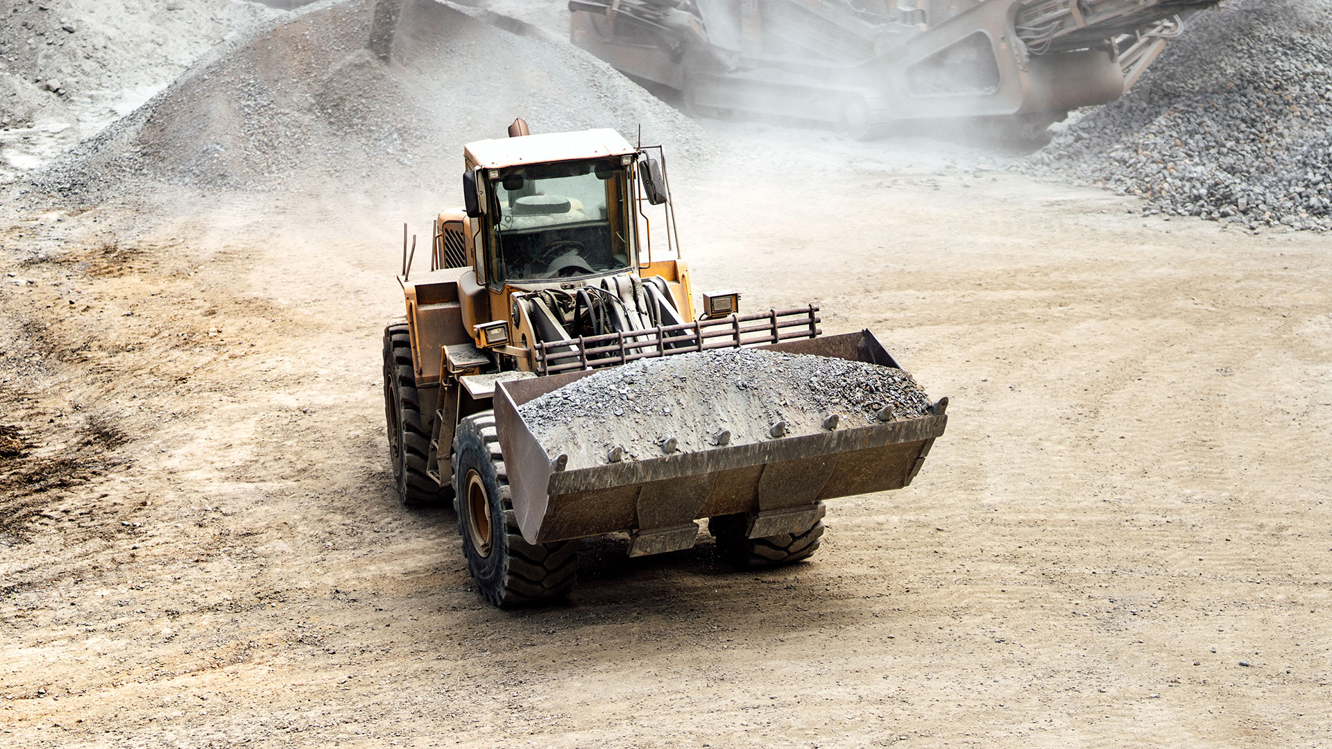 heavy-duty-excavator-working-at-quarry-moving-gravel-road-course-hero-bg